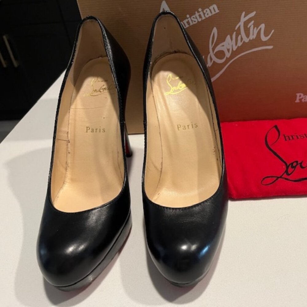 Barely worn Christian Louboutin Platforms